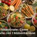 Colorata tavola mediterranea con verdure, legumi e olio d'oliva per rafforzare la barriera intestinale